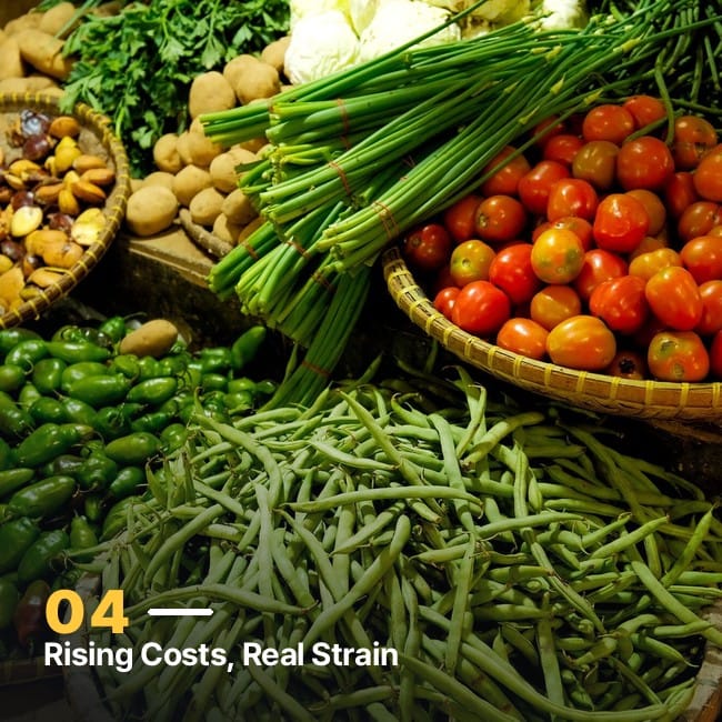 Baskets of fresh produce piled high at a vegetable market